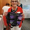 Sue-Martin-with-her-raffle-prize
